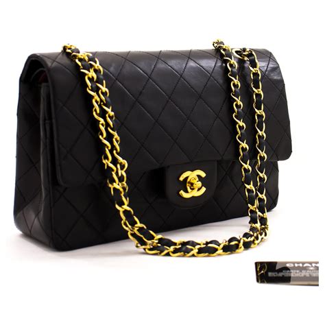 chanel black leather flap bag|Black Chanel leather shoulder bag.